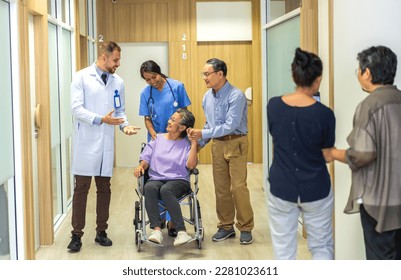 Man doctor with stethoscope service help support discussing and consulting care talk to sick senior asian woman patient in hospital,caregiver,elderly,recovery,illness insurance.healthcare and medicine - Shutterstock ID 2281023611