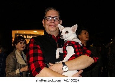 Man And Dog With Matching Outfits At Utica Square Shopping Center Tulsa Oklahoma USA 11-23-2017