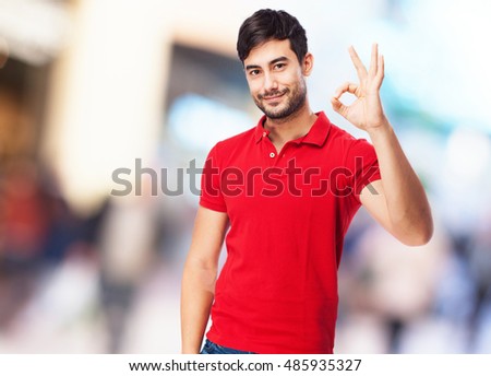 man doing allright sign