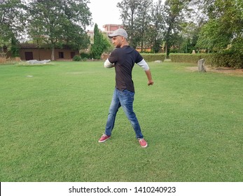 man doing exercise in garden