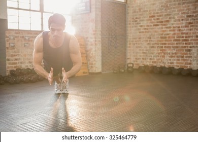 Man Doing Front Clap Push Ups At The Gym