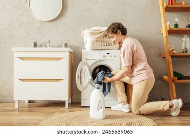 Man doing laundry in front of a washing machine. - Powered by Shutterstock