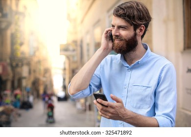 Man Doing Phone Call Stock Photo (Edit Now) 325471892