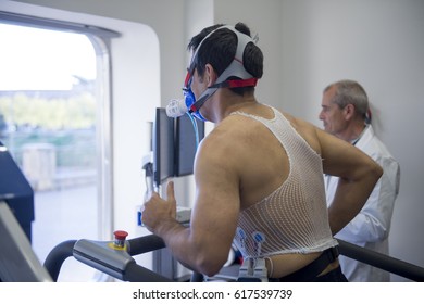 Man Doing A Stress Test Of The Heart Running On A Machine