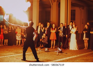 man doing tricks with fire