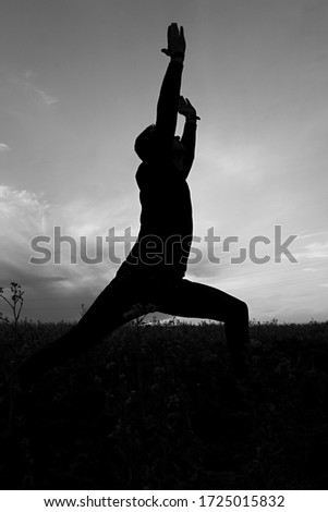 Similar – Two sisters doing gymnastics at sunset