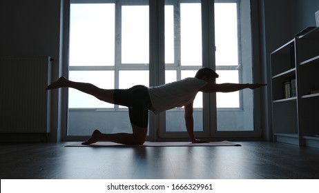 Man Are Doing Yoga At Home In The Morning