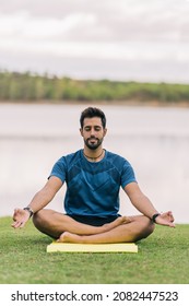 Man Doing The Yoga Lotus Position Outdoors