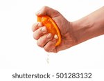 man dramatic squeezes orange. Concept squeezed a man  is tired from work.