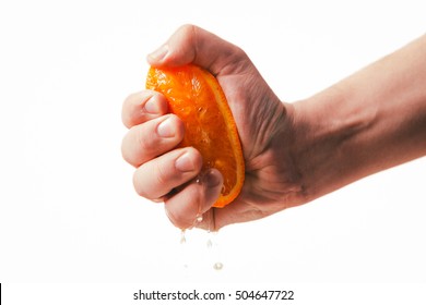 man dramatic squeezes orange. Concept squeezed a man  is tired from work.