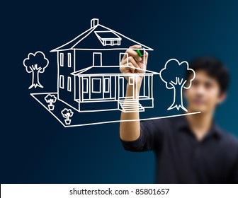 Man Drawing Dream Home