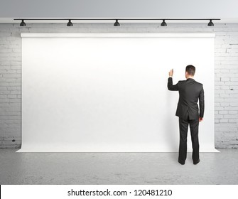 Man Drawing On White Backdrop