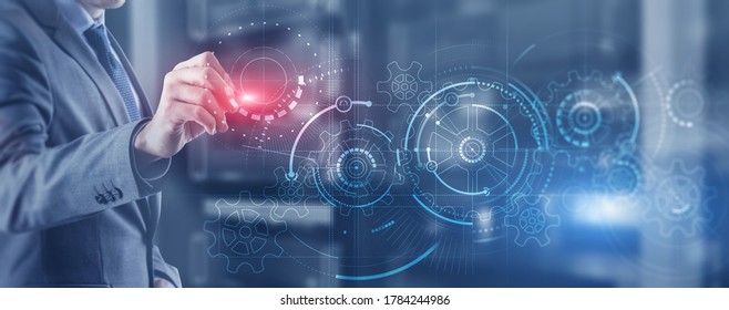 Man draws gears on virtual screen. Blurred Abstract engine room. - Shutterstock ID 1784244986