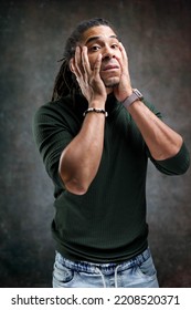 Man With Dreadlocks Isolated On Abstract Background