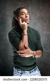 Man With Dreadlocks Isolated On Abstract Background