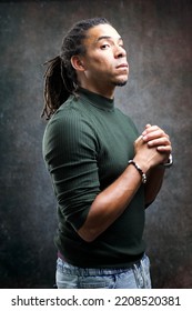 Man With Dreadlocks Isolated On Abstract Background