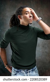 Man With Dreadlocks Isolated On Abstract Background