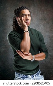 Man With Dreadlocks Isolated On Abstract Background