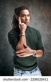 Man With Dreadlocks Isolated On Abstract Background