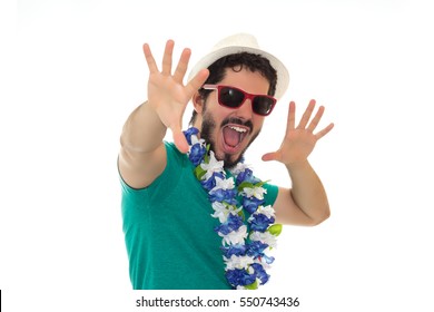 Man dressed for a costume party. Wearing sunglasses, hat and flower necklace. White background. - Shutterstock ID 550743436