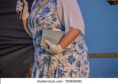 Man Dressed Up Like Woman Preforming On Stage Stand Up Comedy