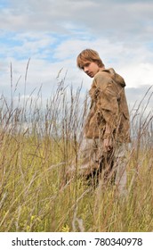 Man Dressed As A Medieval Peasant In The Field