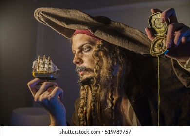 A Man Dressed In A Pirate Suit