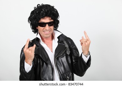 Man Dressed As A Rock Star