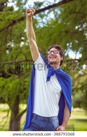 Man dressed as superman in the garden