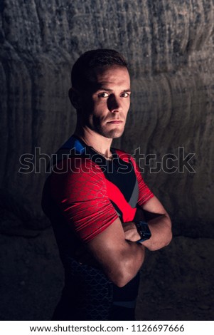 man dressed in triathlon suit