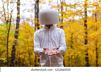 Man Dressed In White Has A Reversed Crystal Bowl On His Head While Showing Generosity - Pictured In The Forest While Automn Colors Are At Their Best In Quebec, Canada