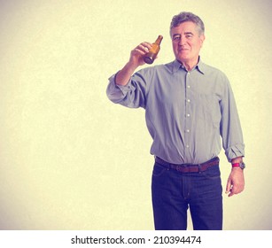 Man Drinking A Beer