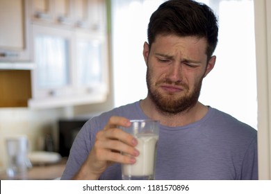 Man Drinking Milk. Man Tryed Spoiled Milk. Lactose Allergy. Negative Emotions