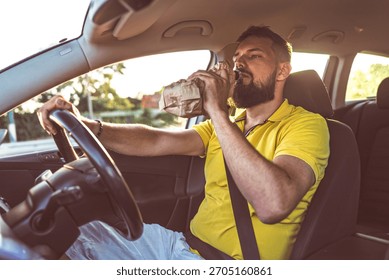 Man Drinking While Driving car