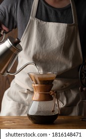 Man Dripping Coffee With Carafe 