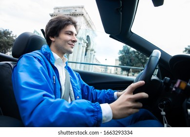 Man drive the car in the city