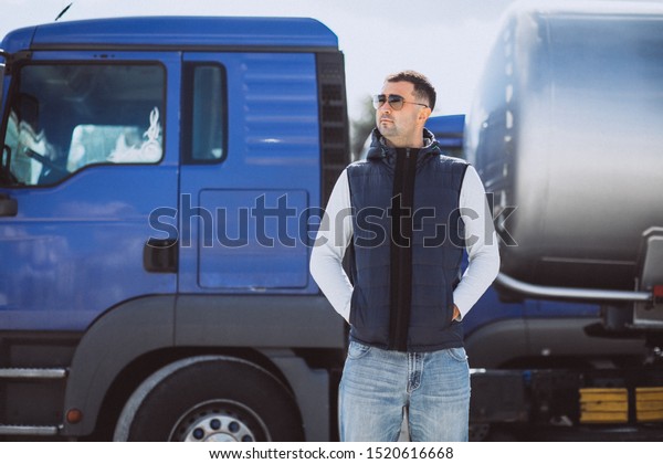 Man driver of\
the lorry in a logistic\
company