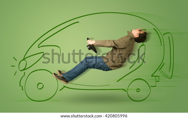 Man\
drives an eco friendy electric hand drawn car\
concept