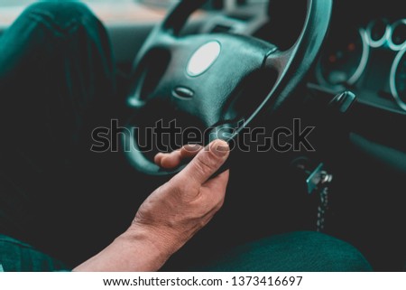man driving car close up 