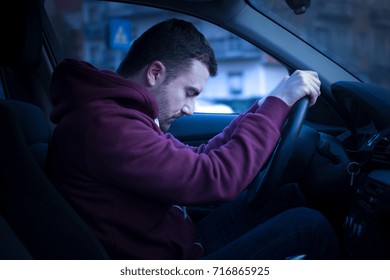 Man Driving Car And Falling Asleep At The Wheel