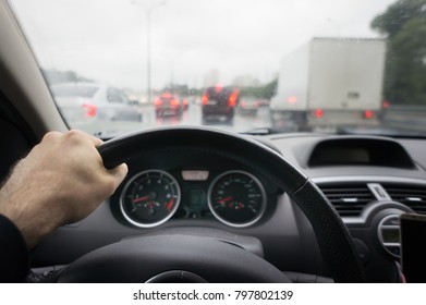 Man Driving Car From Rear View On The Highway