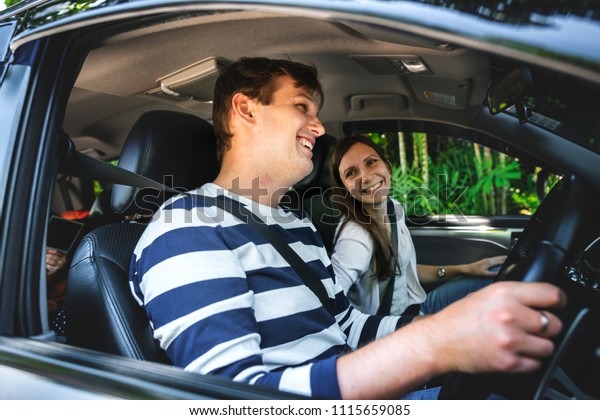 Man driving a family
car