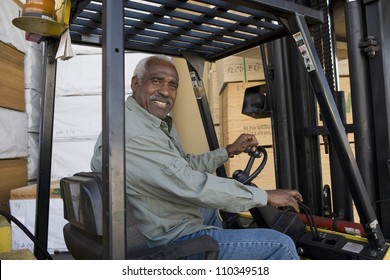 Man Driving Forklift