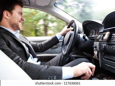  Man Driving His Car