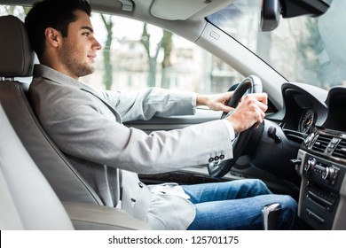 Man Driving His Car