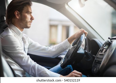 Man Driving His Car