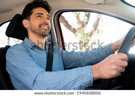 Similar – Image, Stock Photo man in driving car with arms out of the window