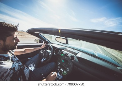 Man Driving His Sport Car