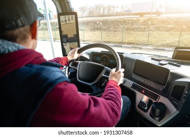 Man Driving A Truck With Rear View Camera