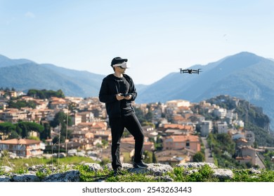Man drone pilot with fpv drone. Virtual reality glasses for fly his high-speed racing drone.